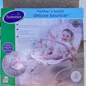 Deluxe baby bouncer, remote control, in sealed box.